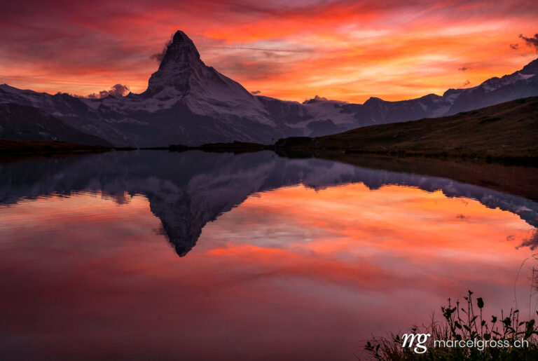 Autumn picture Switzerland. sky on fire over Matterhorn. Marcel Gross Photography