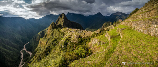 Peru Bilder. stitched panoramic shot of Machu Picchua with it's terraces on the steep slopes in Peru. Taken by Marcel Gross Photography
