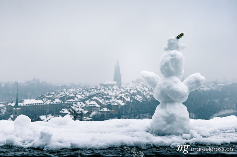Bern pictures. Winter in Bern with a snowman. Marcel Gross Photography