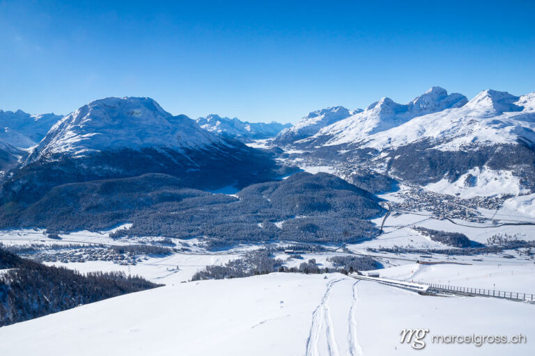 . view from Muottas Muragl into Engadine Valley on a pristine winter day. Marcel Gross Photography