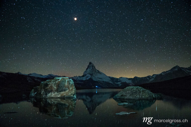 . Matterhorn at blood moon with reflection in alpine lake. Marcel Gross Photography