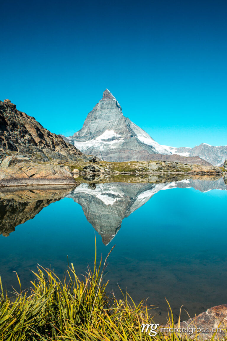 . reflection of Matterhorn at mountain lake. Marcel Gross Photography