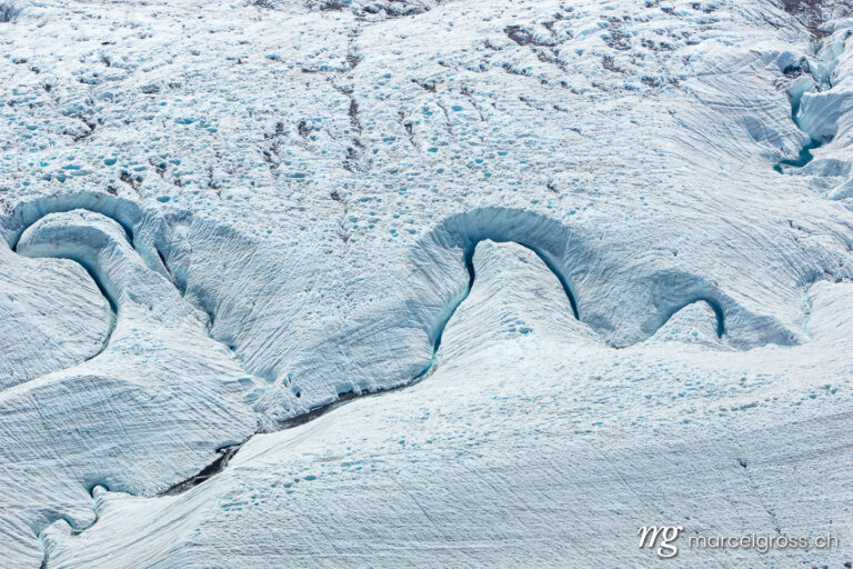 . glacial creek with melt water at Gornergletscher. Marcel Gross Photography