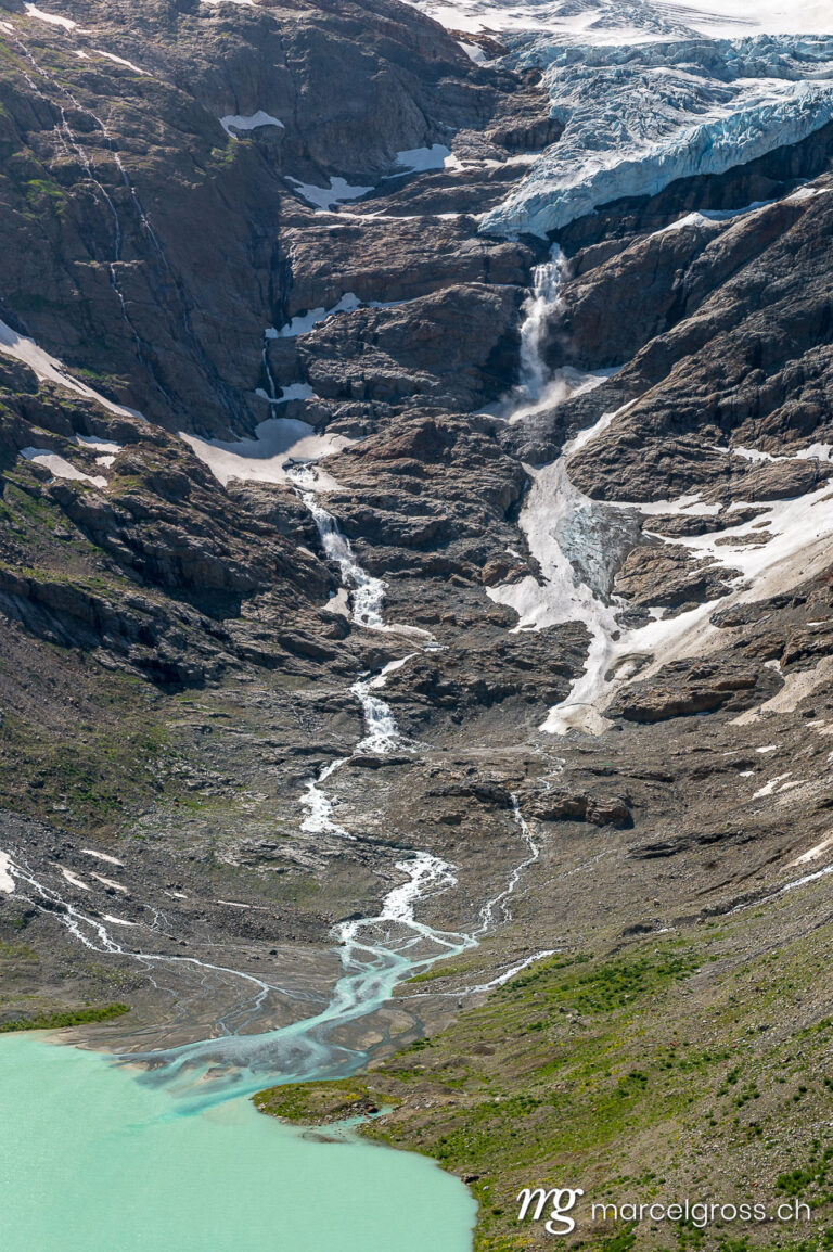 . fast shrinking Trift glacier with lake in summer. Marcel Gross Photography