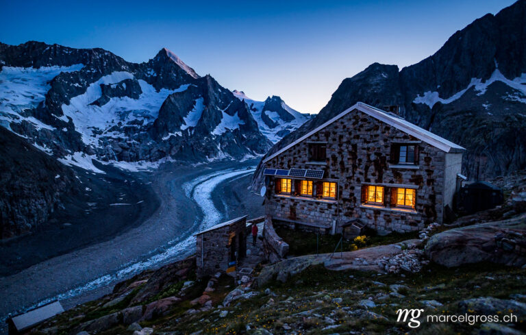 . blue hour at dawn at a swiss alpine club mountain hut in the valais alps. Marcel Gross Photography