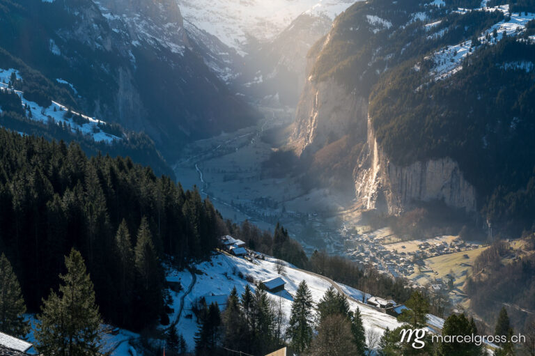 . dramatic light over Lauterbrunnen Valley on a beautiful winter morning . Marcel Gross Photography