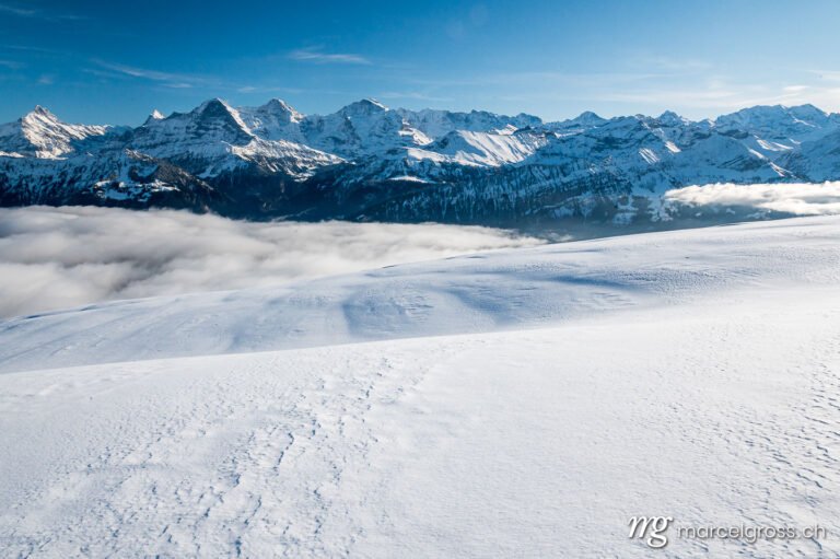 Winter picture Switzerland. Eiger Mönch and Jungfrau in winter with snow drifts. Marcel Gross Photography