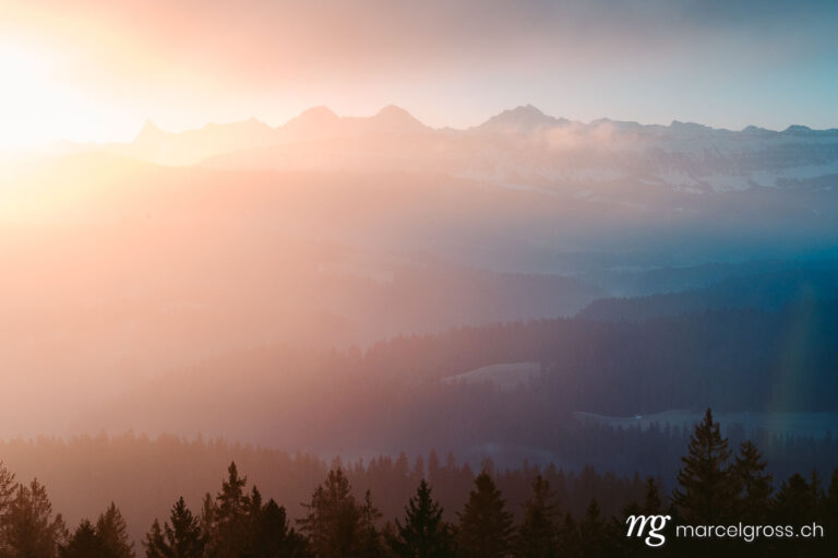 . morning light on the Bernese Alps with the hills of Emmental in front. Marcel Gross Photography