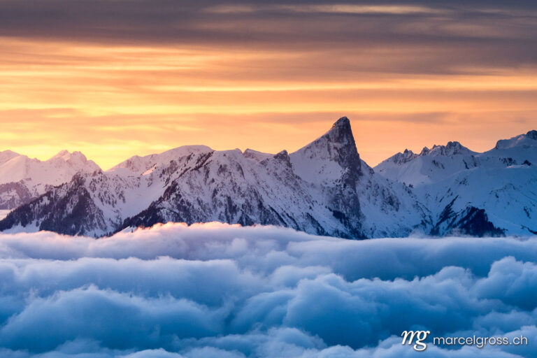 . sea of fog in front of Mount Stockhorn at a winter sunset. Marcel Gross Photography