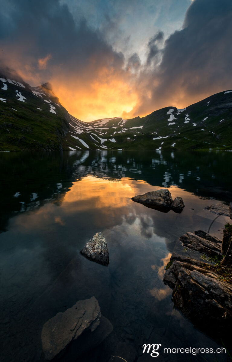 . spectacular sunset at an alpine lake near Grindelwald in the Swiss Alps. Marcel Gross Photography
