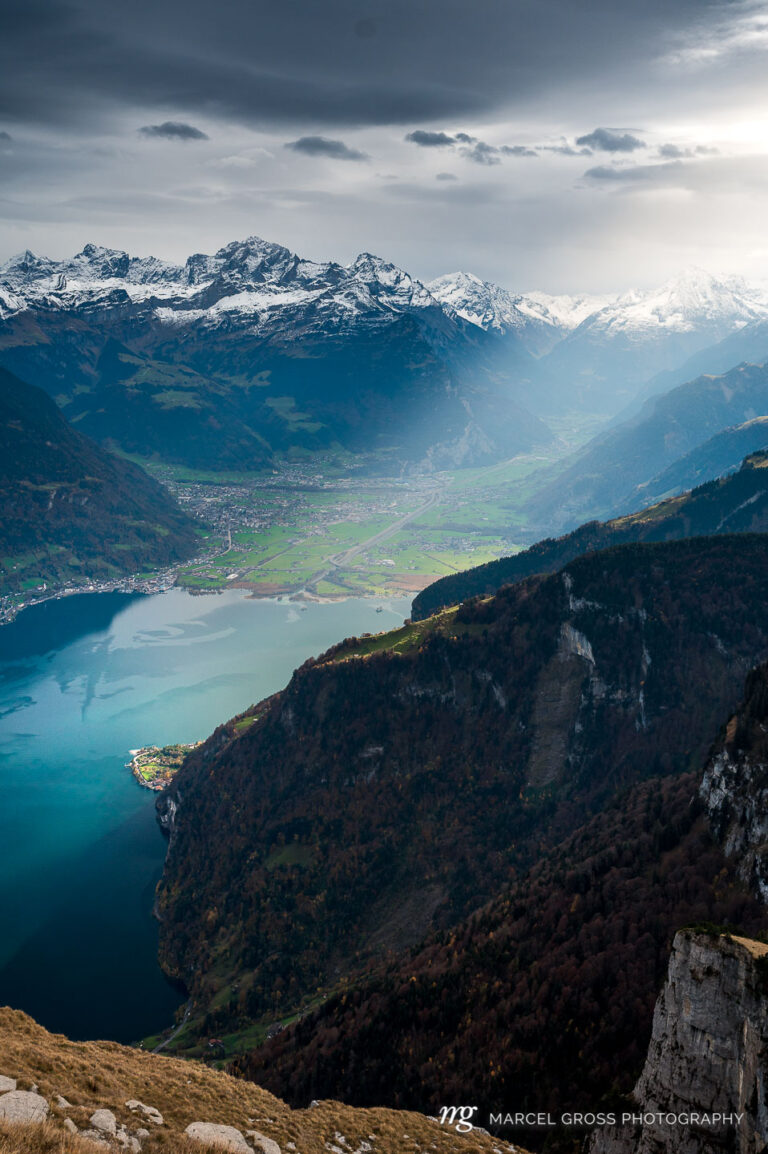 dramatic light on Urnersee with Flüeli and Altdorf with Bristen and . Taken by Marcel Gross Photography