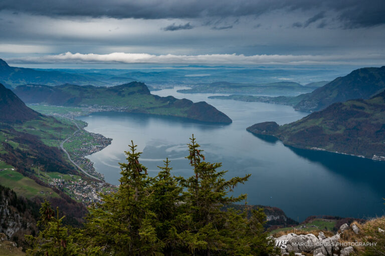 view from Niederbauen over Bürgenstock in direction of Lucerne on a rainy autumn day. Taken by Marcel Gross Photography