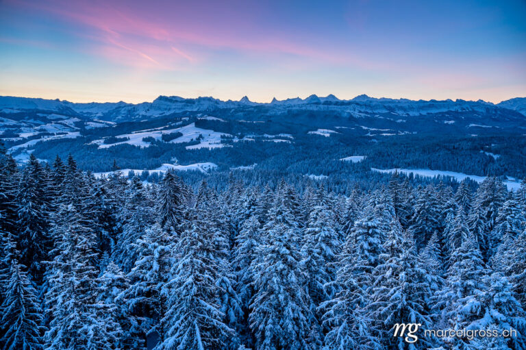 Winter picture Switzerland. Panorama of Emmental on a winter morning with Bernese Alps. Marcel Gross Photography