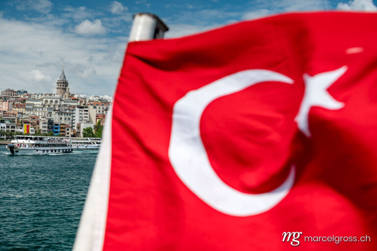 istanbul pictures. Turkish flag in the wind in front of Galata Tower, Istanbul. Marcel Gross Photography