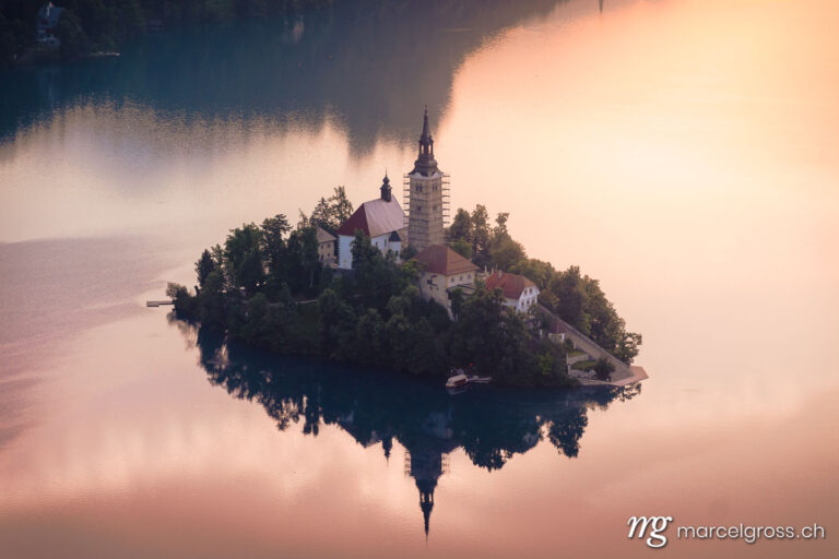 slovenia pictures. Sunrise over Lake Bled with famous island with church. Marcel Gross Photography