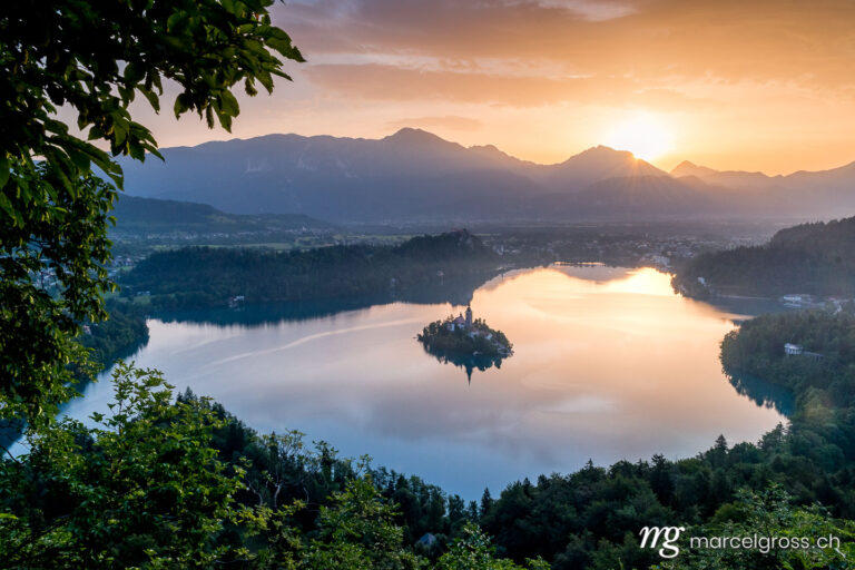 slovenia pictures. Sunrise over Lake Bled with famous island with church. Marcel Gross Photography