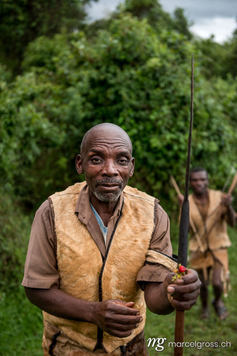 Uganda pictures. Batwa men in the mountain forest in Mgahinga Gorilla National Park, Uganda. Marcel Gross Photography