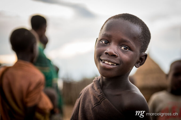Uganda Bilder. a karamojong boy in the remote Karamoja Region of Uganda. Marcel Gross Photography