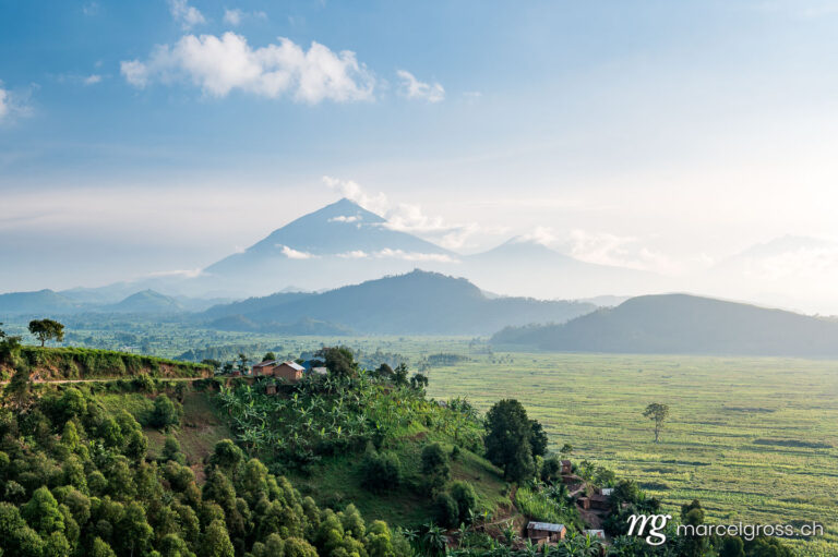 Uganda pictures. landscape of Mount Muhabura and Lake Mutanda in the late afternoon. Marcel Gross Photography