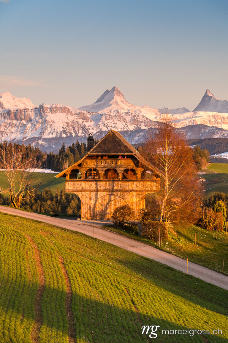 Emmental pictures. Stöckli at sunset with Schreckhorn in the background. Marcel Gross Photography