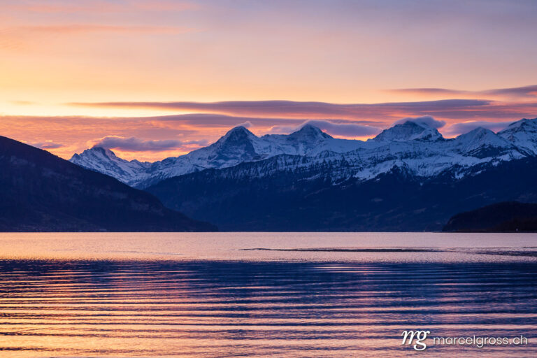 Lake Thun pictures. Sunrise on Lake Thun with Eiger Mönch and Jungfrau. Marcel Gross Photography